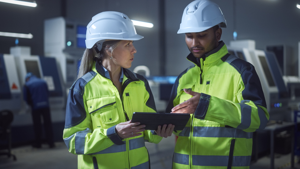 Chief,Engineer,And,Project,Manager,Wearing,Safety,Vests,And,Hard